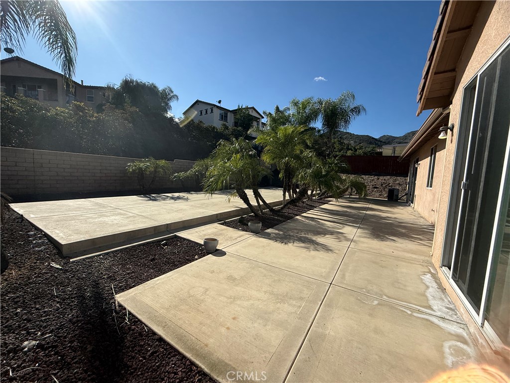 8783 Hunt Canyon Road Corona, CA 92883 - Photo 22 of 24 a view of a terrace with a bench