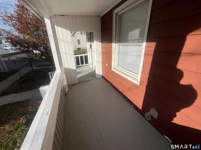 a view of entry way with wooden door