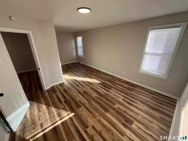 a view of an empty room and window