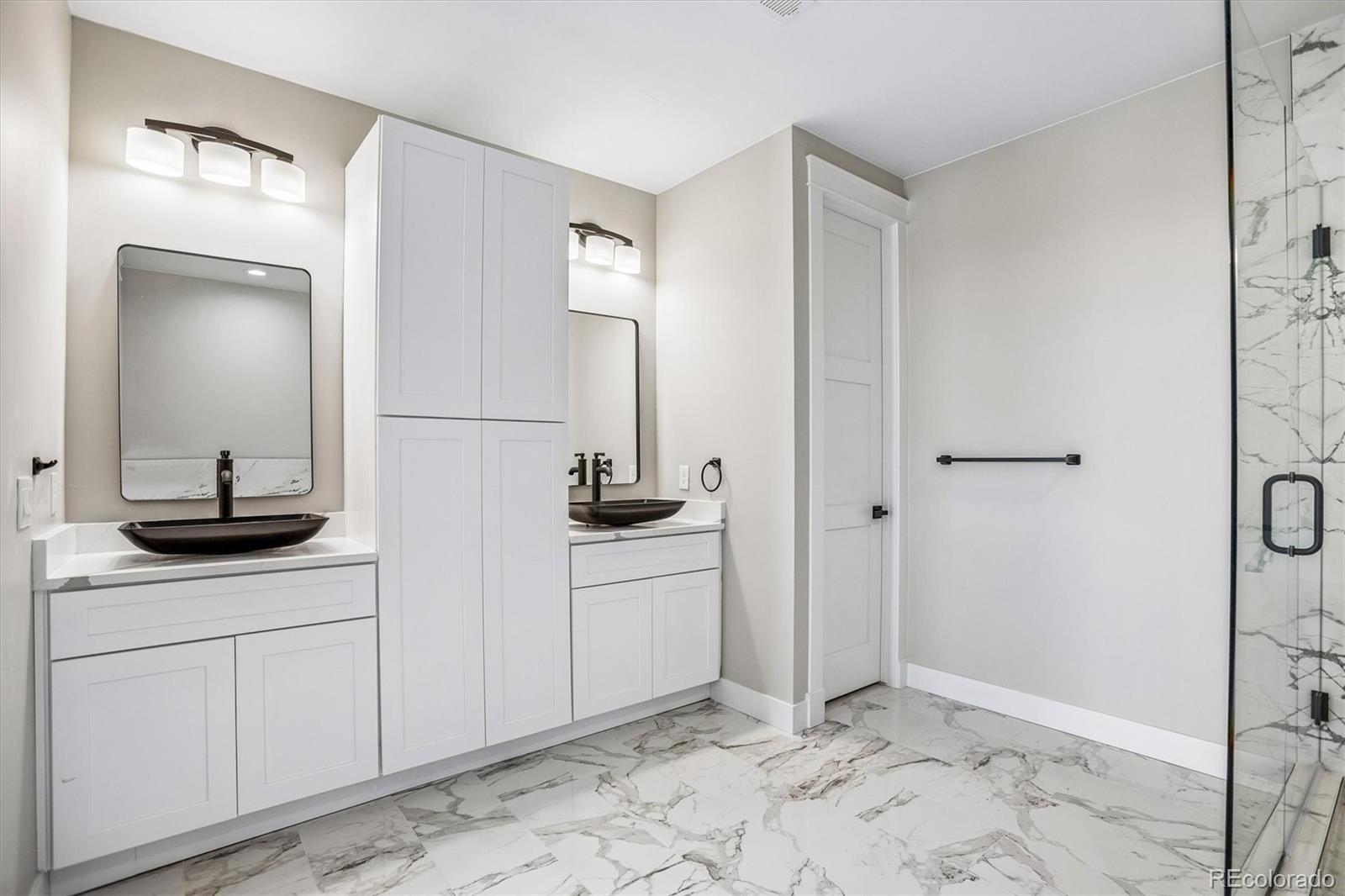 13350 Imboden Road Hudson, CO 80642 - Photo 33 of 50 a bathroom with a sink and a mirror