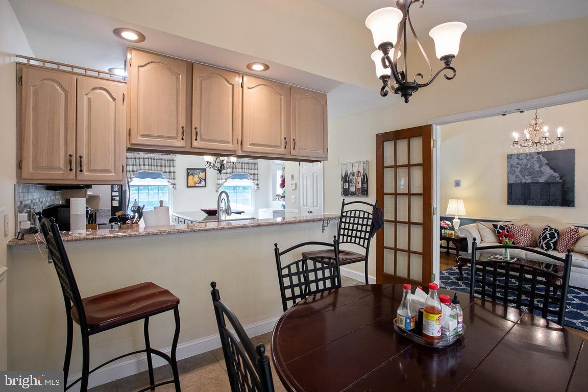 5712 Columbia Road Columbia, MD 21044 - Photo 10 of 26 Dinning with living room and kitchen view