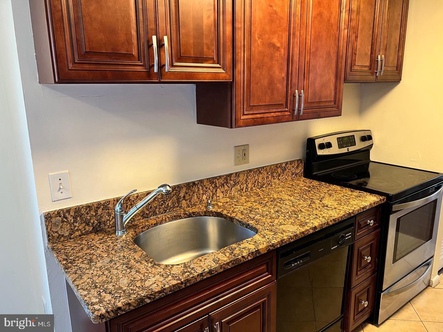 7927 Mandan Road, Unit 301 Greenbelt, MD 20770 - Photo 8 of 20 Modern Kitchen with Granite