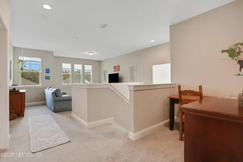 a living room with furniture and a couch