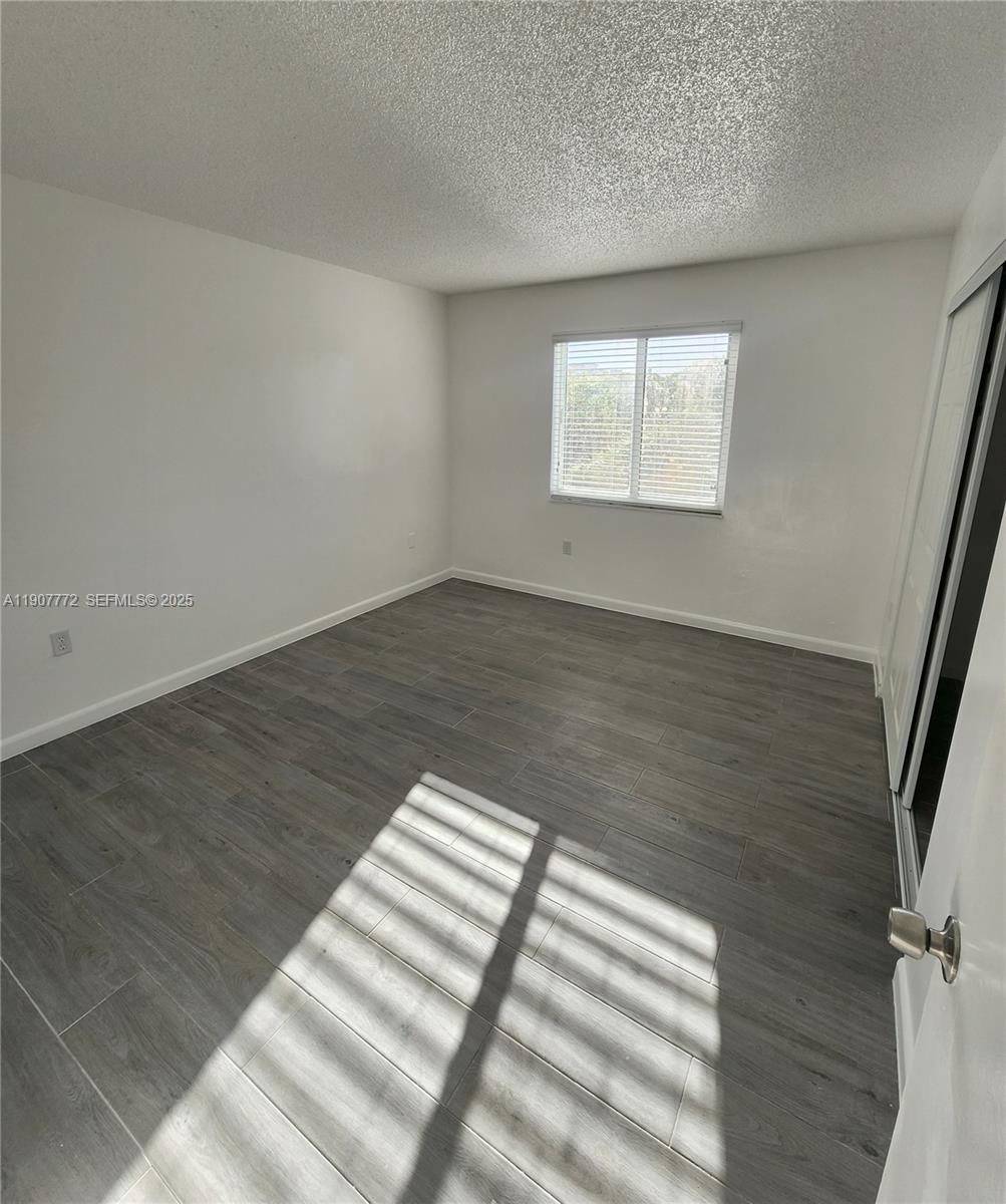 10900 Southwest 196th Street, Unit 213 Cutler Bay, FL 33157 - Photo 9 of 15 wooden floor in a room