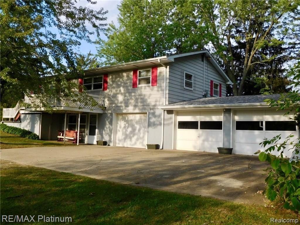 7320 Bennett Lake Road Fenton, MI 48430 - Photo 4 of 35 fullsizeoutput_19ec.jpeg