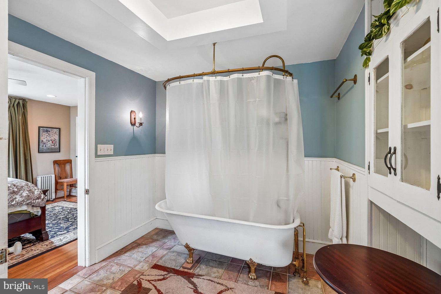 16 Maple Avenue Washington Grove, MD 20880 - Photo 33 of 58 Charming bathroom with vintage tub and decor.