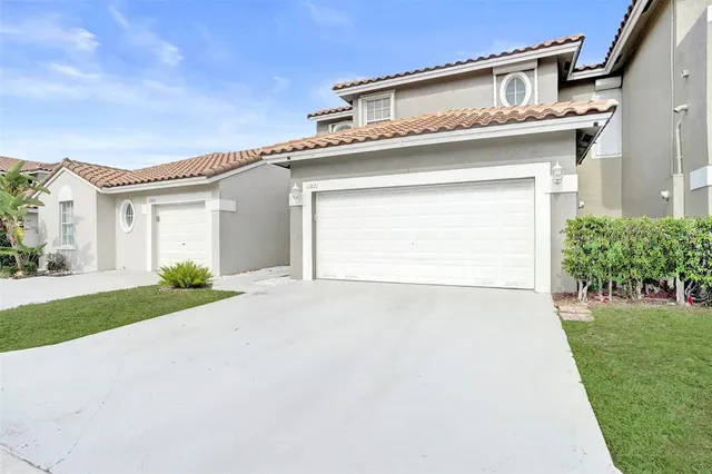 a white house with a outdoor space