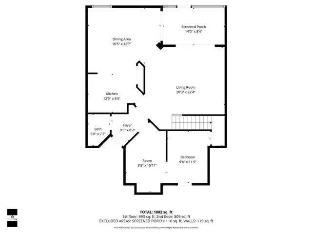 an aerial view of a house with a garden