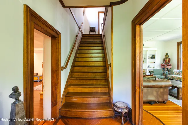 a view of a bathroom with a sink and a mirror