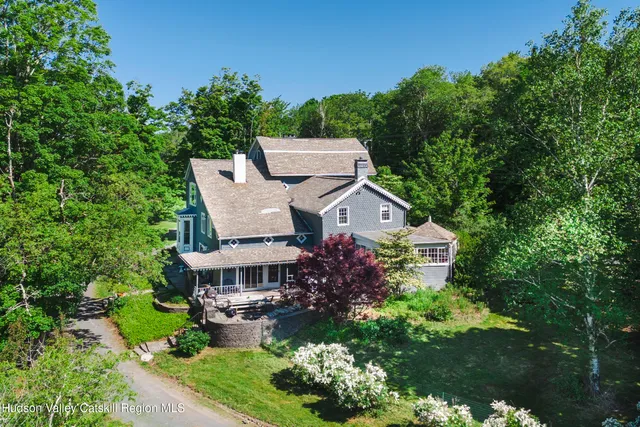 aerial view of a house with a garden