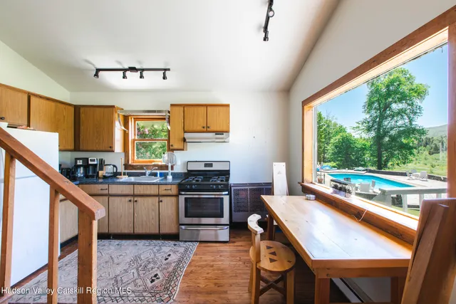 a bedroom with a bed and a chair