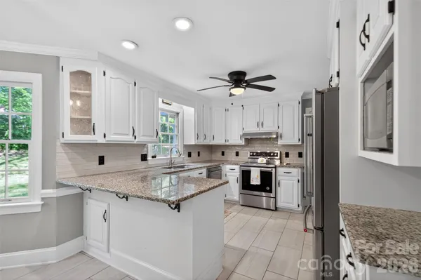 $563,500 | 1507 Dennbriar Drive Northwest, Concord, NC 28027