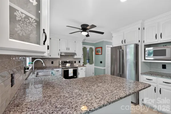 $563,500 | 1507 Dennbriar Drive Northwest, Concord, NC 28027