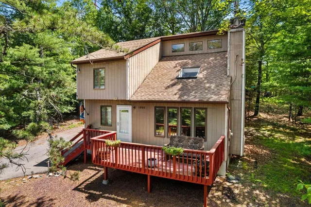 front view of a house with a garden