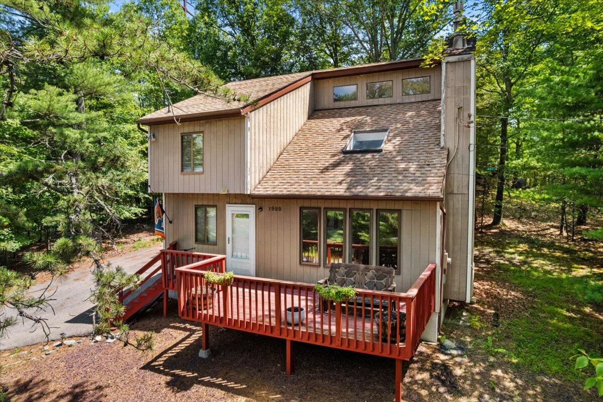 front view of a house with a garden