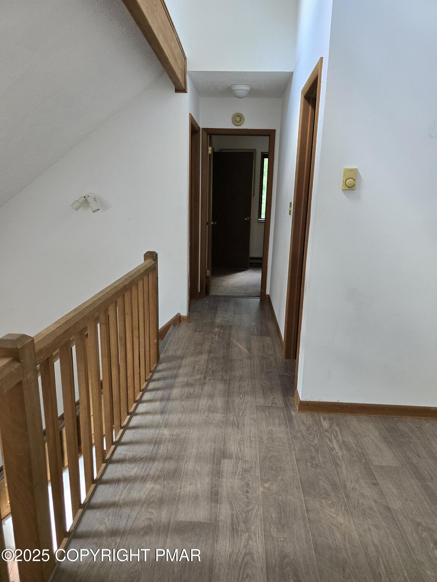 117 Manchester Drive Bushkill, PA 18324 - Photo 25 of 33 a view of a hallway with wooden floor