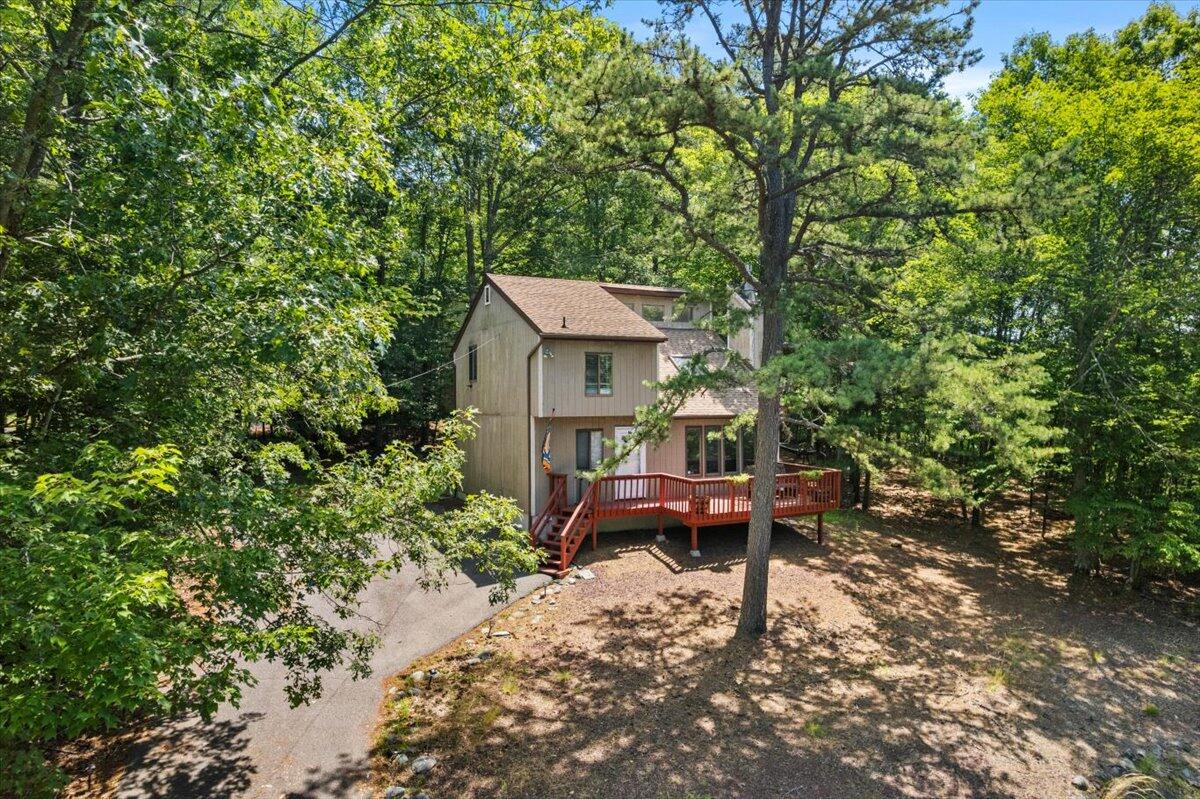 117 Manchester Drive Bushkill, PA 18324 - Photo 5 of 33 a view of a house with a yard and sitting area