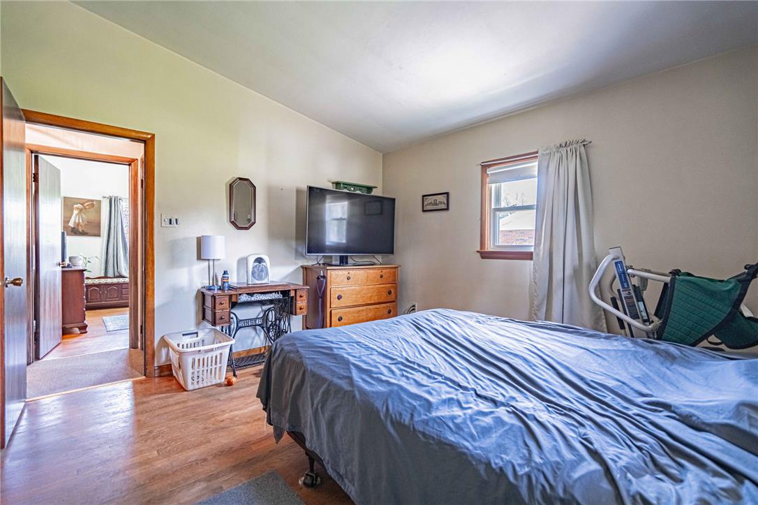 579 Cherry Road Northampton, PA 18067 - Photo 28 of 57 Hardwood floors and a sun-filled window create a comfortable, inviting bedroom retreat.