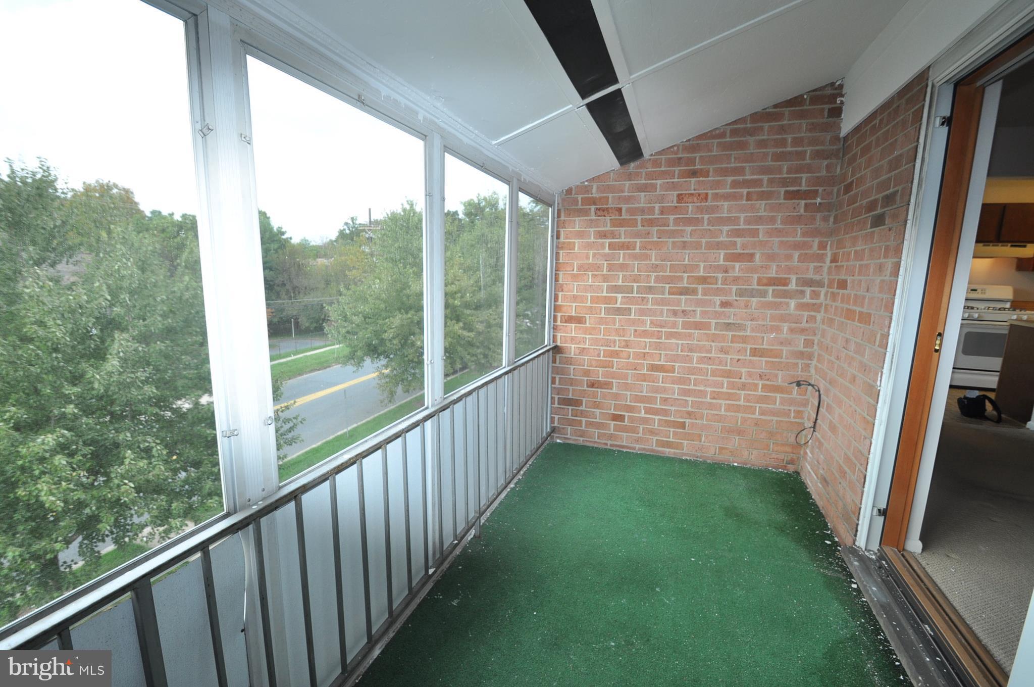 3350 Hewitt Avenue, Unit 302 Silver Spring, MD 20906 - Photo 4 of 12 LARGE COVERED PORCH