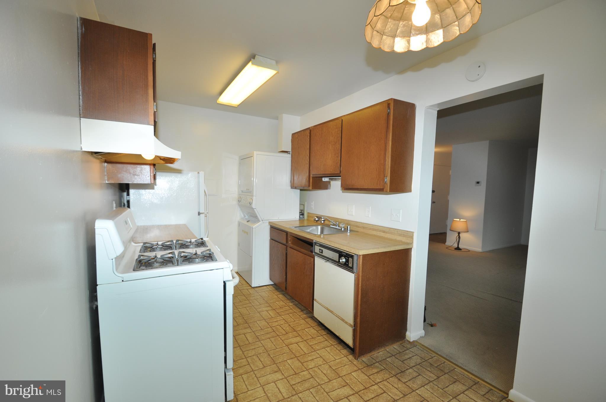 3350 Hewitt Avenue, Unit 302 Silver Spring, MD 20906 - Photo 8 of 12 KITCHEN WITH GAS COOKING