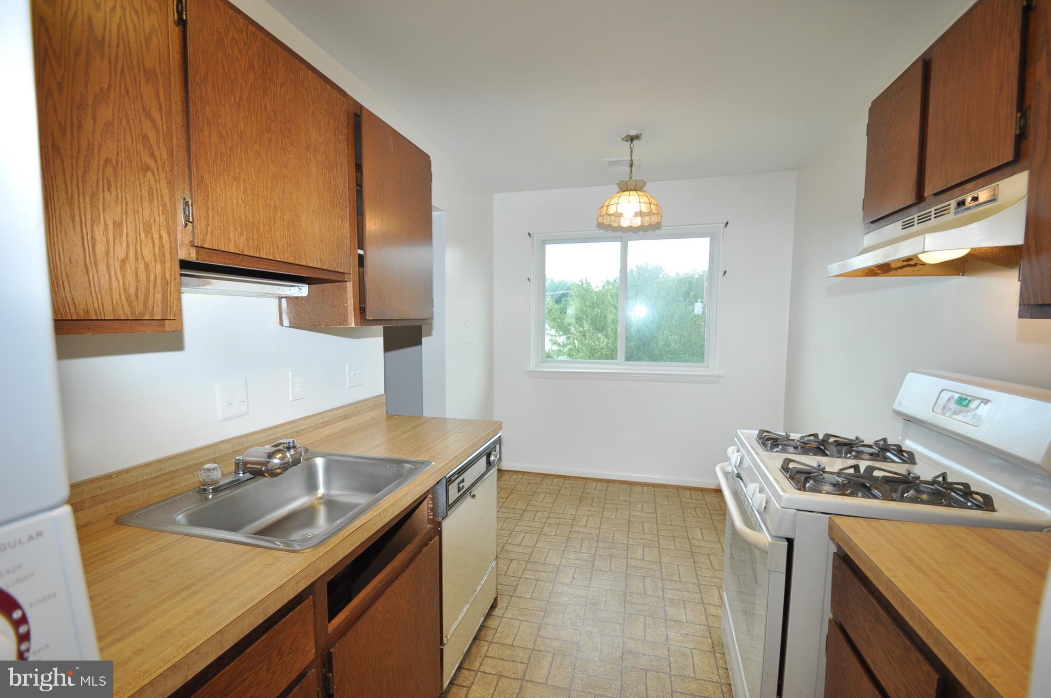 3350 Hewitt Avenue, Unit 302 Silver Spring, MD 20906 - Photo 9 of 12 KITCHEN WITH TABLE SPACE