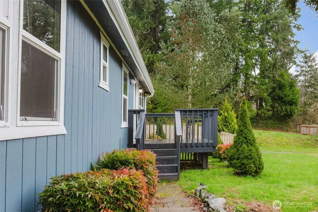 a backyard of a house with lots of green space