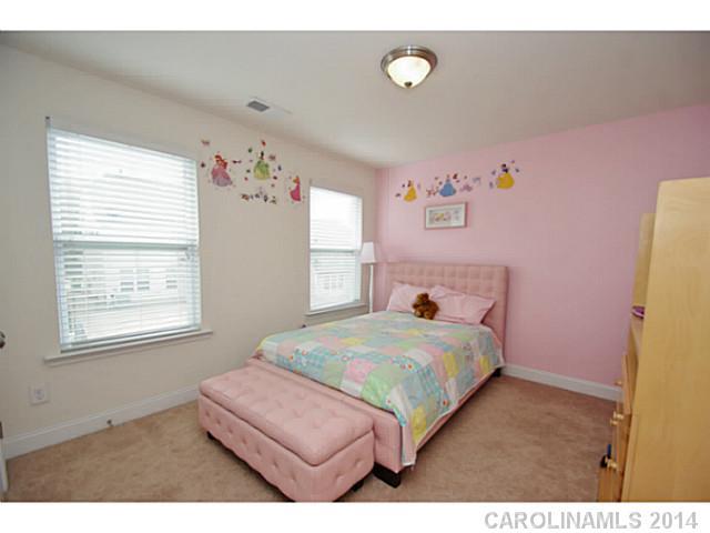 2005 Fallondale Road, Unit 921 Waxhaw, NC 28173 - Photo 12 of 16 a bedroom with a bed and a window