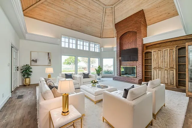 a kitchen with stainless steel appliances a stove and cabinets