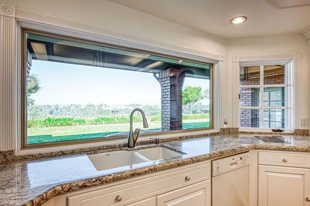 a view of a livingroom with wooden floor