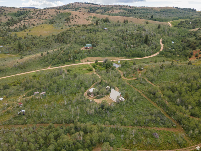 23 Scare Canyon, Unit 23 Logan, UT 84321 - Photo 30 of 33 Expansive hillside property featuring multiple residential structures and extensive tree coverage