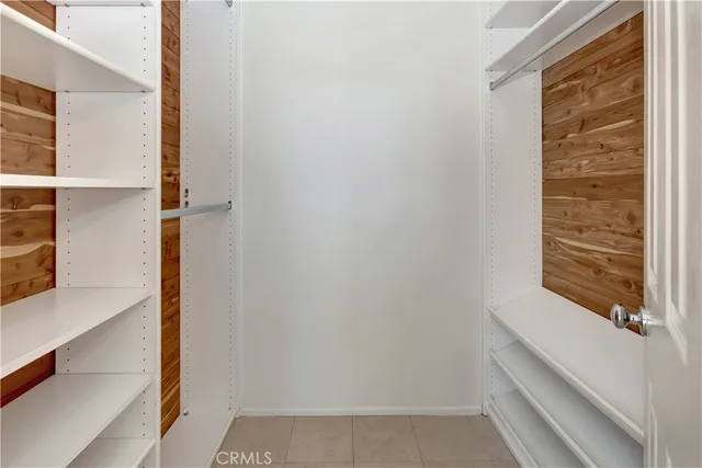 a front view of multiple houses with yard