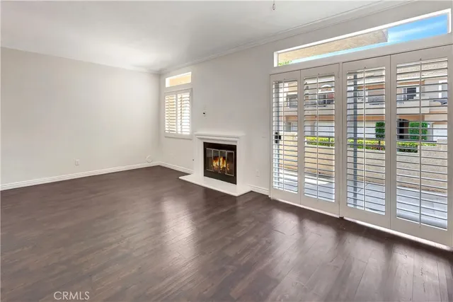 a kitchen with kitchen island stainless steel appliances a sink cabinets and a counter top space