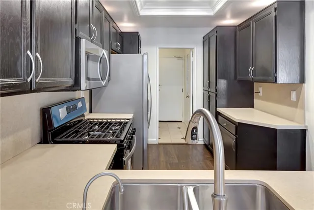 a bathroom with a toilet sink and shower