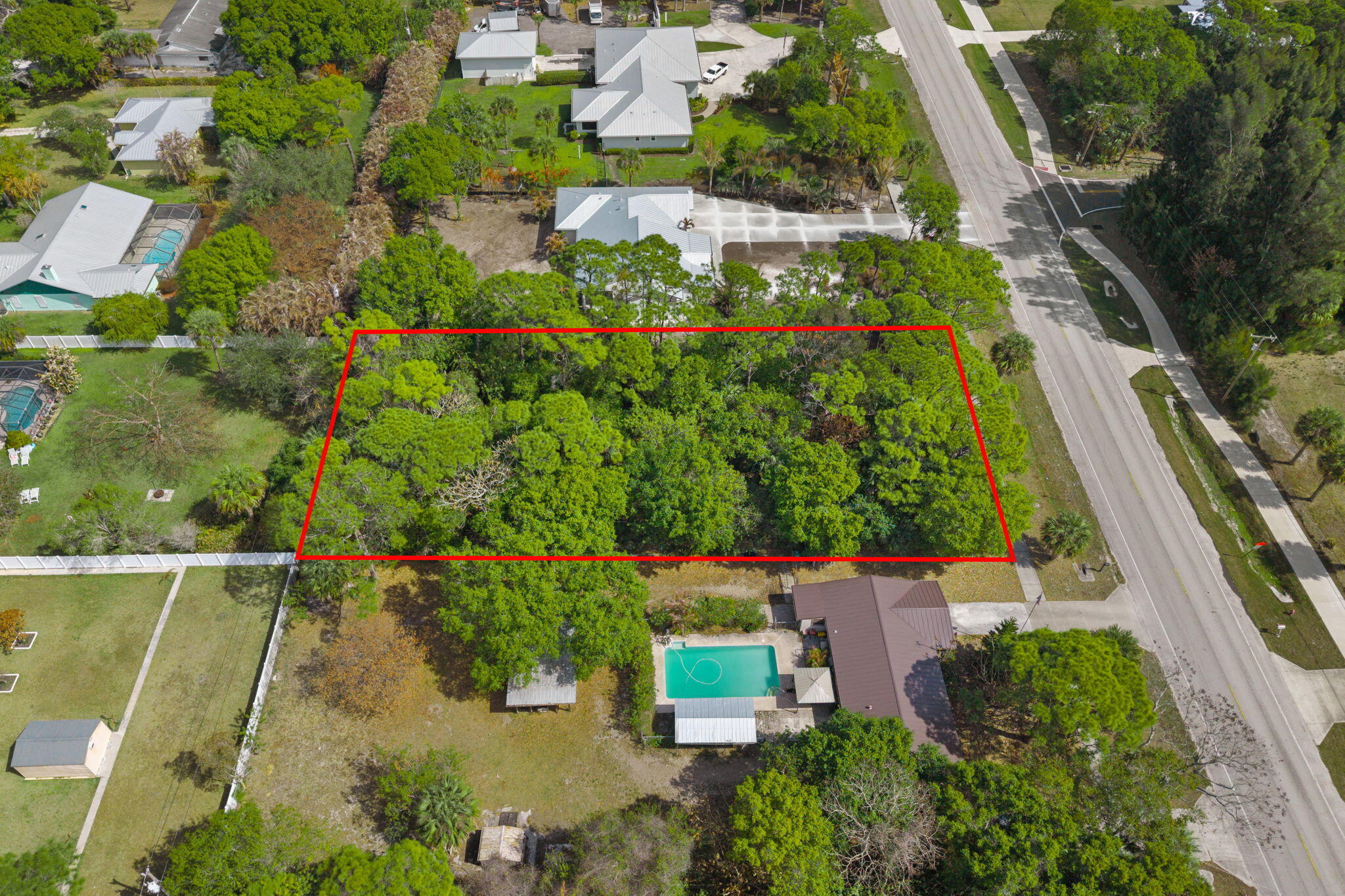 404 East Midway Road Fort Pierce, FL 34982 - Photo 5 of 11 an aerial view of house with swimming pool