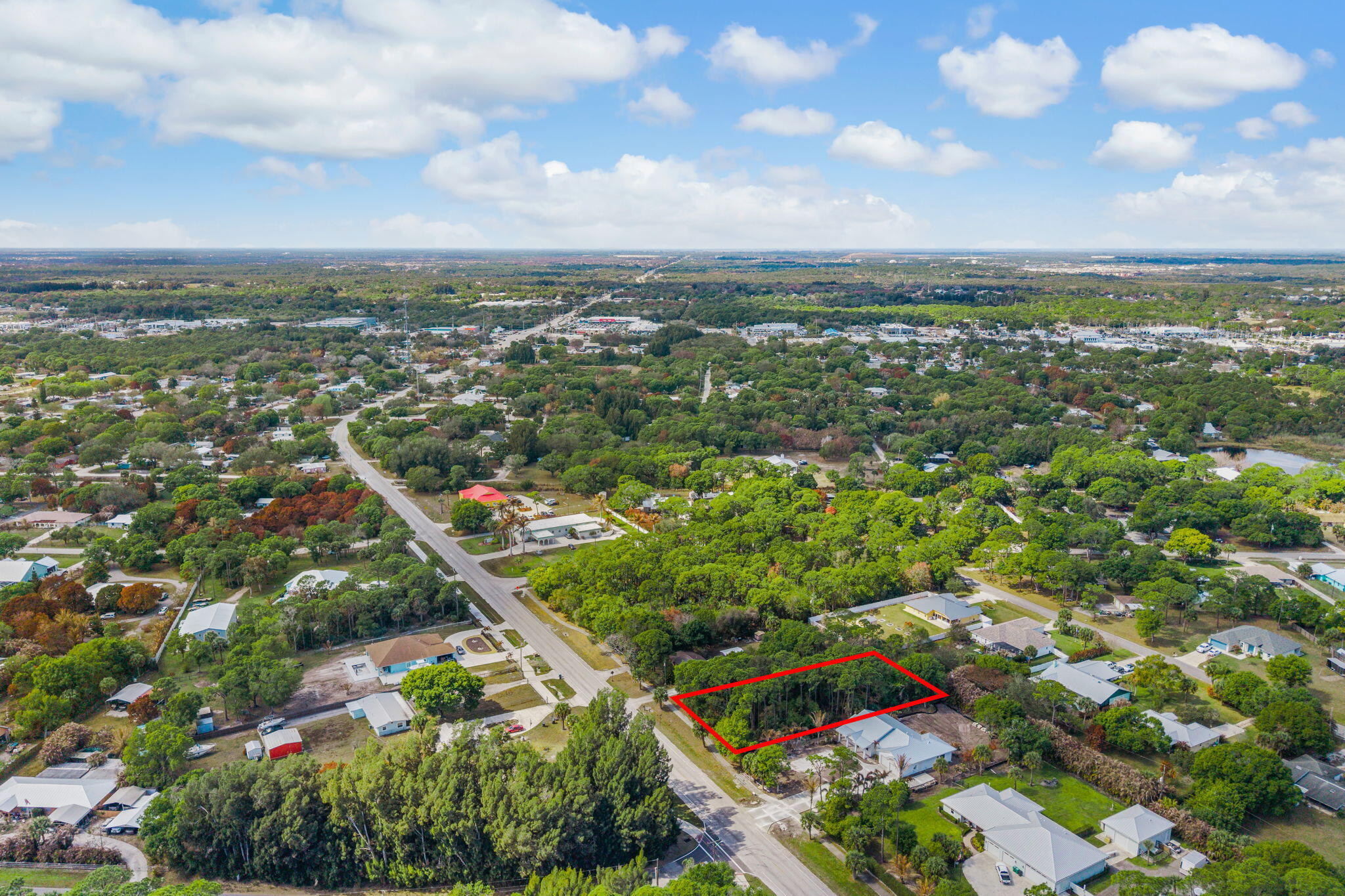 404 East Midway Road Fort Pierce, FL 34982 - Photo 7 of 11 a view of city with lots of bushes