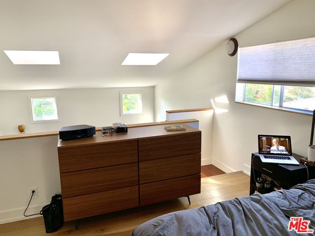 a kitchen with stainless steel appliances granite countertop a stove and a refrigerator