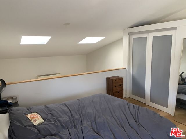 a kitchen with stainless steel appliances a stove and a refrigerator