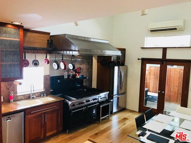 a living room with furniture and rug