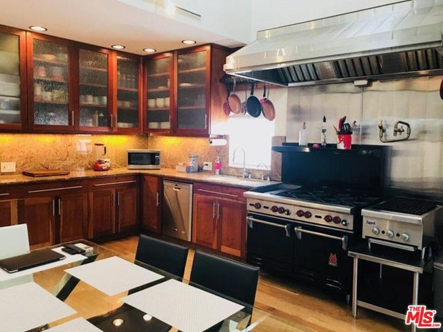 a living room with furniture fireplace and a flat screen tv