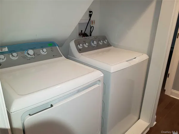 a utility room with dryer and washer