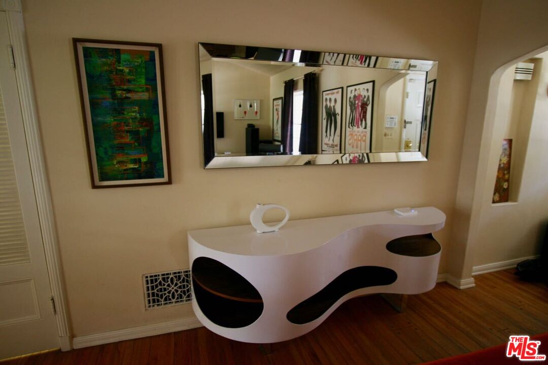 10317 Lauriston Avenue Los Angeles, CA 90025 - Photo 13 of 52 a bathroom with a sink and a mirror