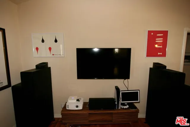 a kitchen with stainless steel appliances granite countertop white cabinets sink and stove