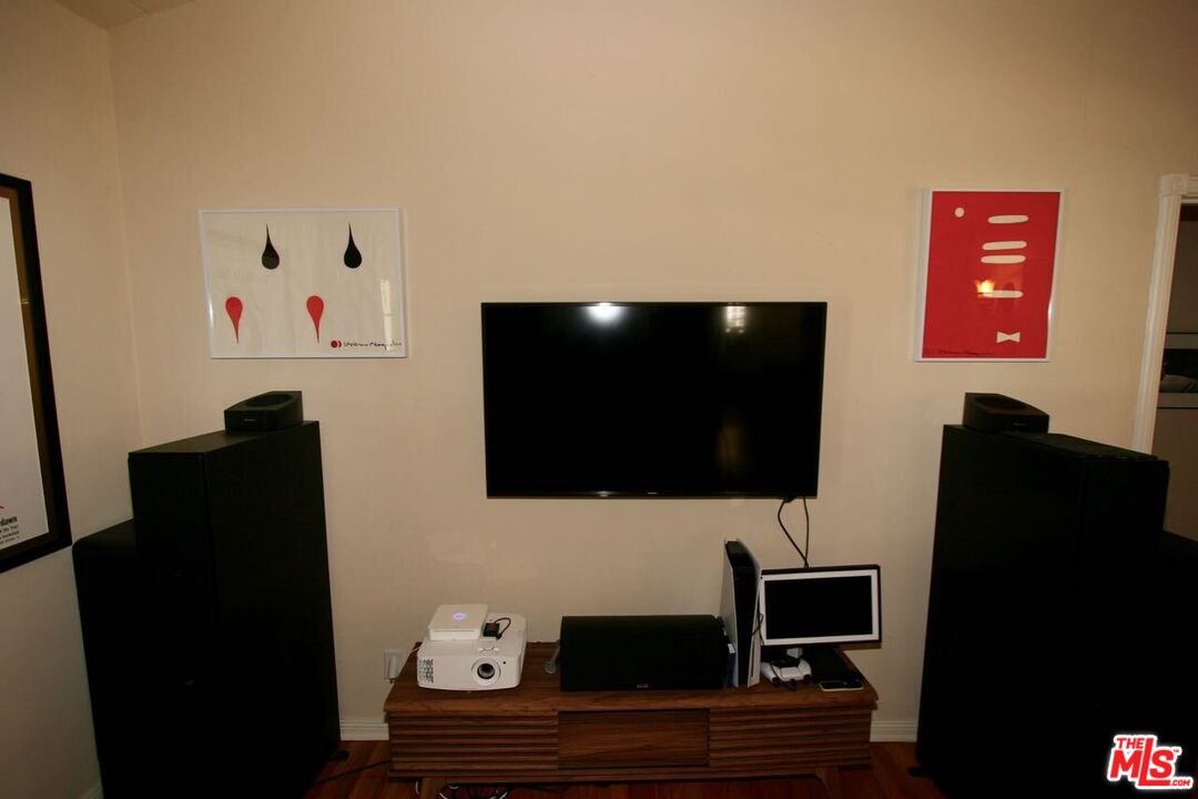 10317 Lauriston Avenue Los Angeles, CA 90025 - Photo 17 of 52 a living room with furniture and a flat screen tv
