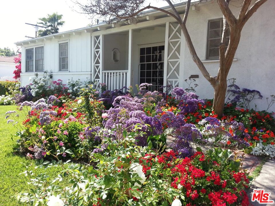 10317 Lauriston Avenue Los Angeles, CA 90025 - Photo 2 of 52 a bunch of flowers are in front of house