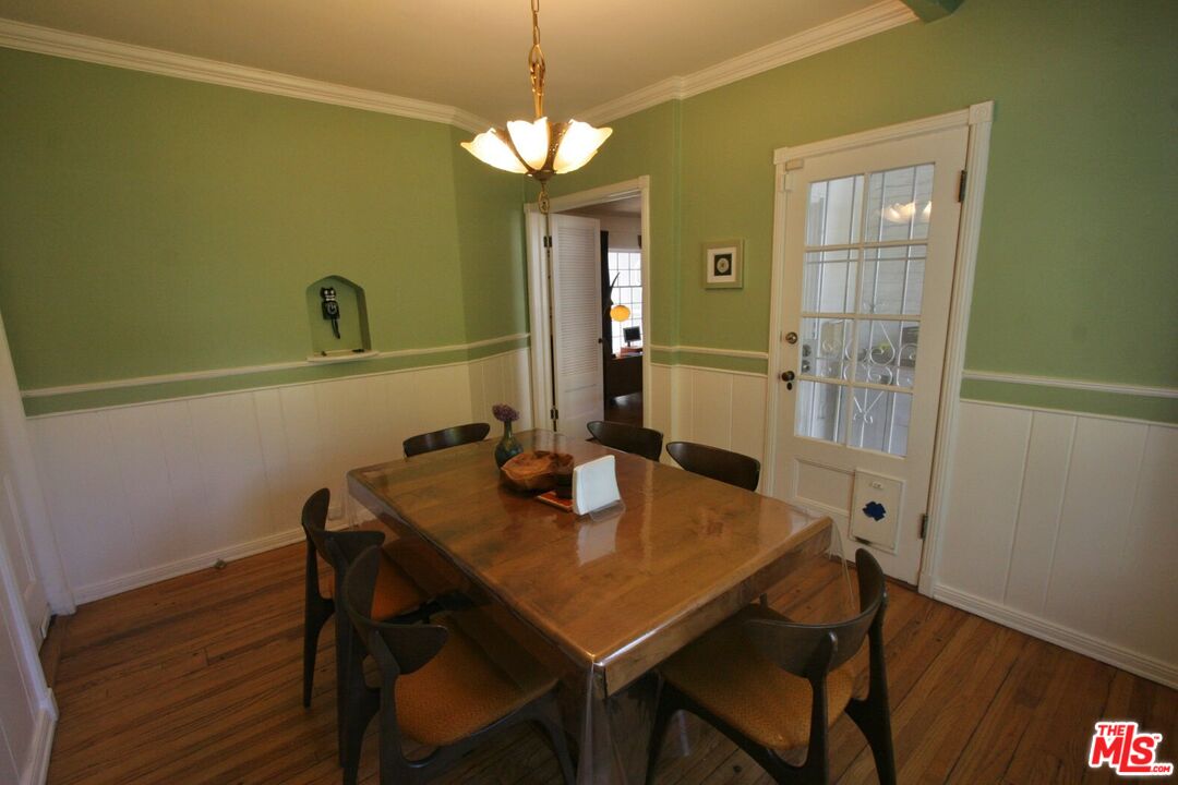 10317 Lauriston Avenue Los Angeles, CA 90025 - Photo 24 of 52 a view of a dining room with furniture and wooden floor