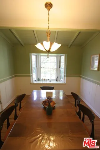 a view of a door and a window