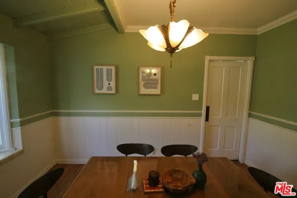 a bedroom with a bed and cabinets