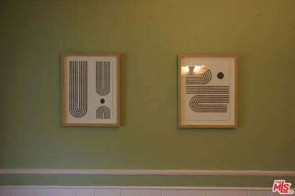 a bedroom with bed and a desk