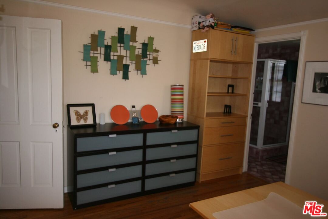 10317 Lauriston Avenue Los Angeles, CA 90025 - Photo 31 of 52 a bedroom with a bed and cabinets