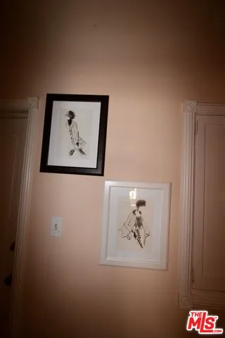 a bedroom with a bed and chair